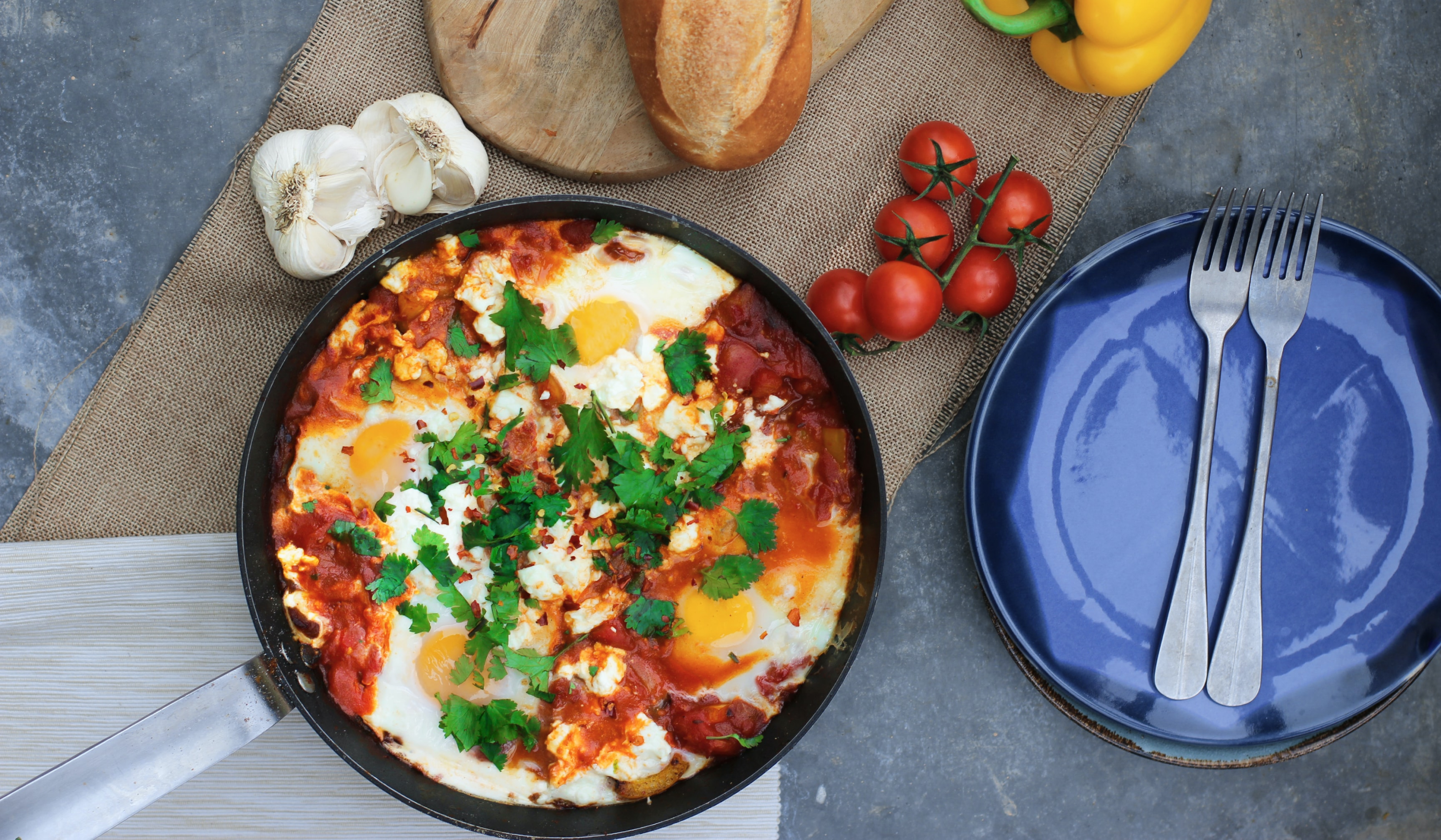 Warm hearty shakshuka in a skillet on a countertop